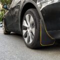 Tesla sárvédő